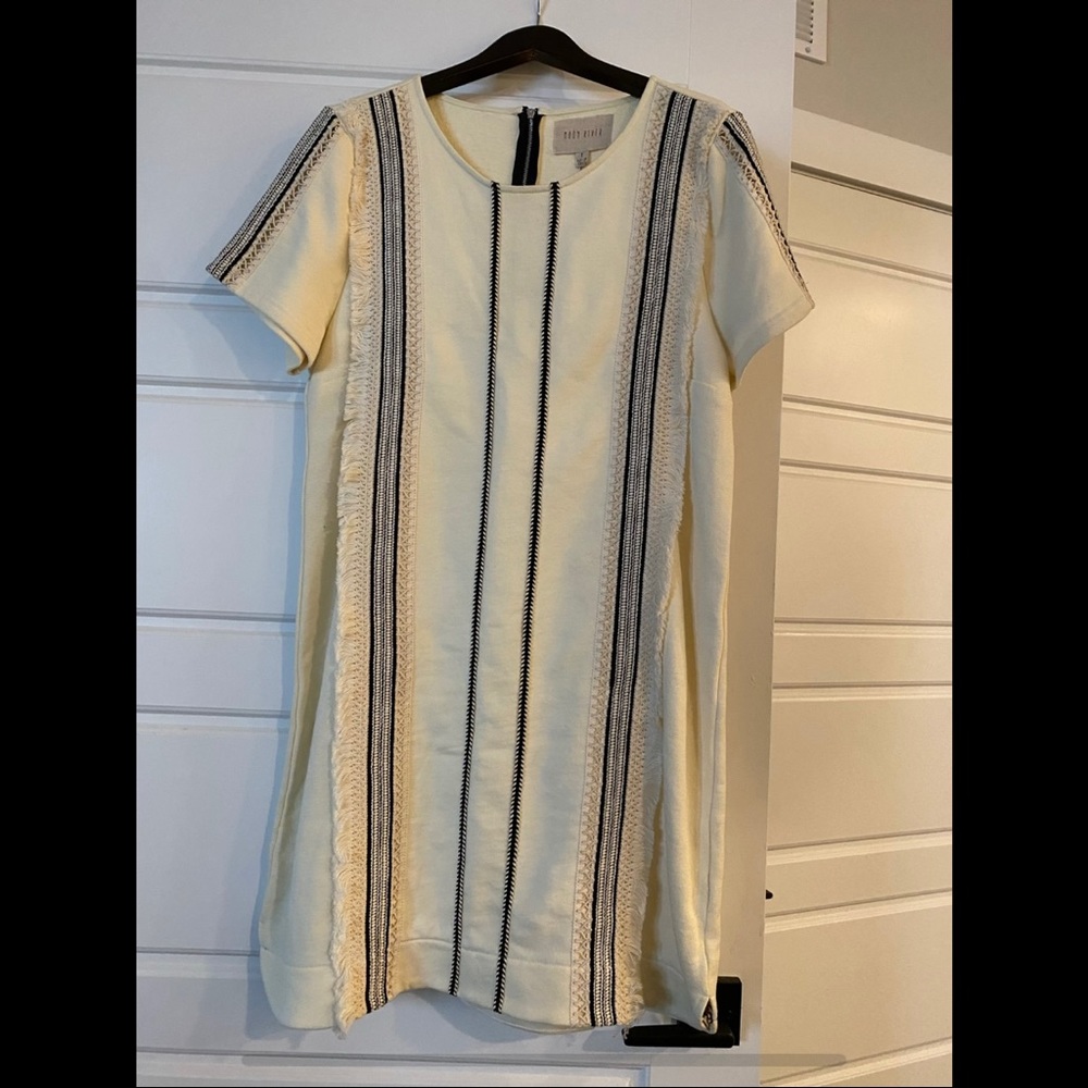 Cream knit dress with black stitching